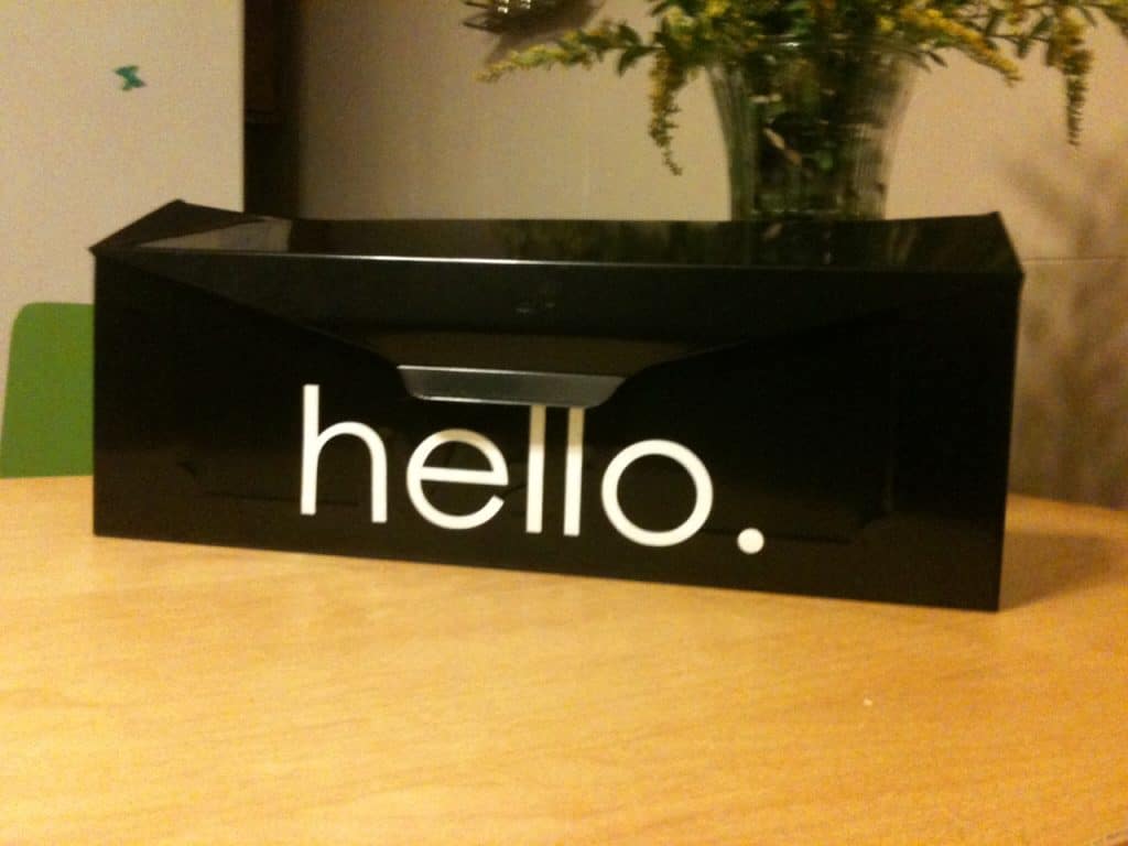 Black mailbox with the word hello in white.