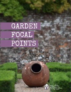 metal sculpture serves as focal point in traditional graden