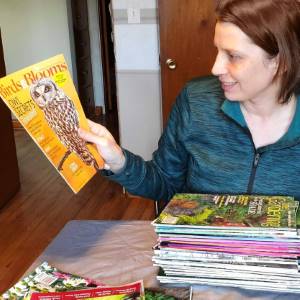 Amy reading Birds & Blooms Magazine