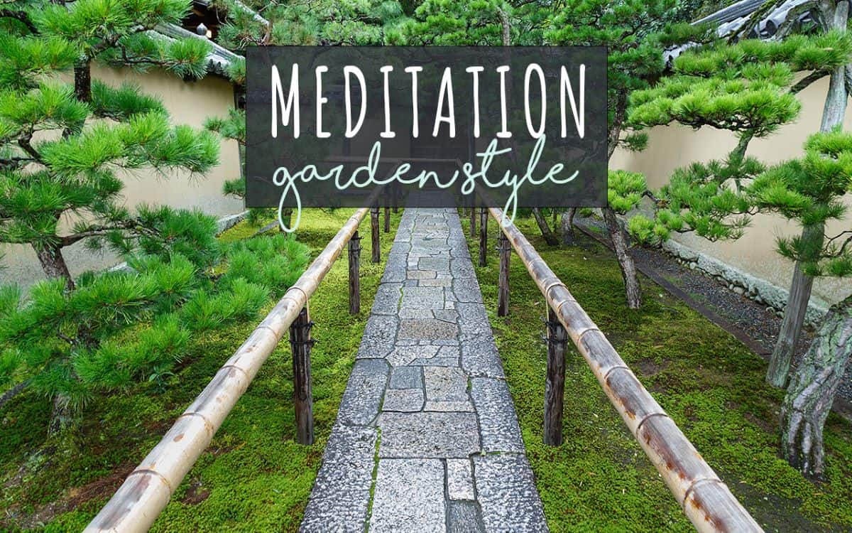 meditation garden style paver pathway with bamboo railing