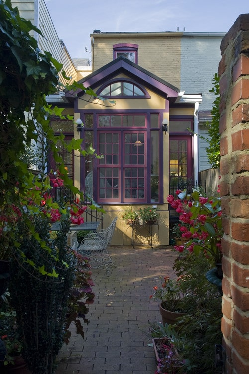 A two-toned purple front door in classic purple combined with deep grape.