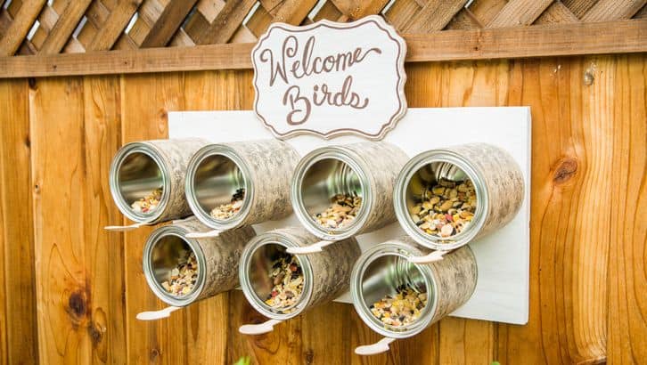recycled can bird feeding station