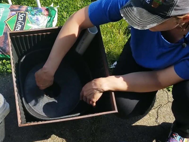 Insert rubber feed bowl into tapered container