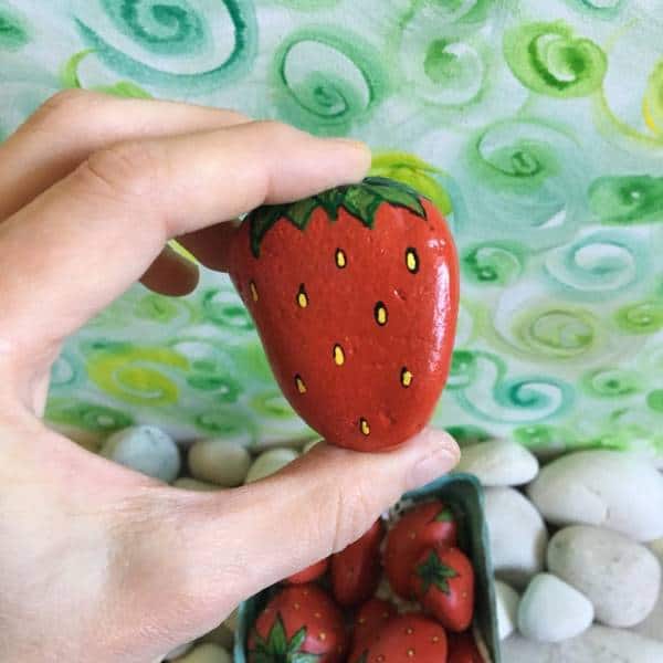 Strawberry painted garden stones