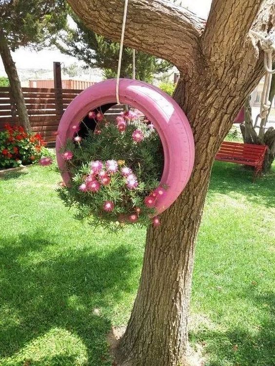Pink tire swing planter