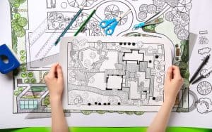 landscape designer with design plans